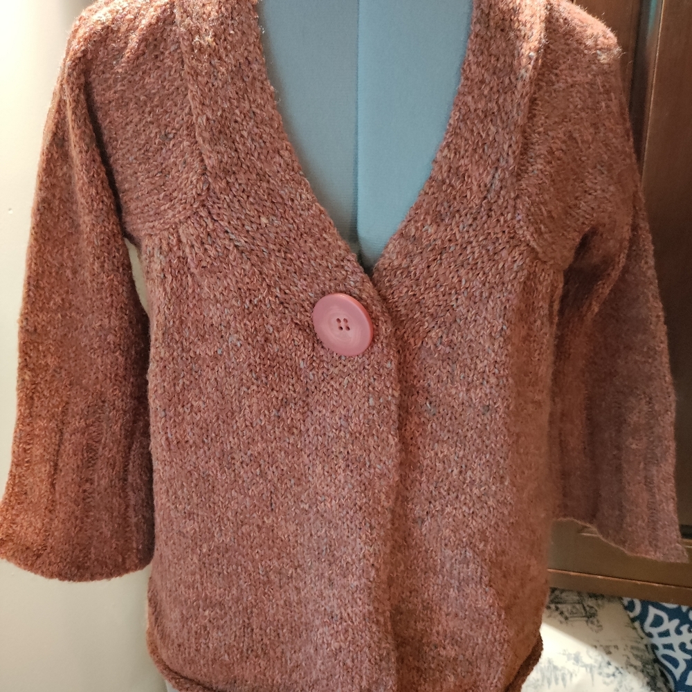 Orange sweater size Large. Single button closure. 3/4 bell sleeve. Good stretch.